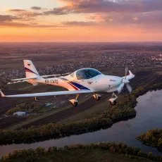 Полет на закате на самолете Aquila A210